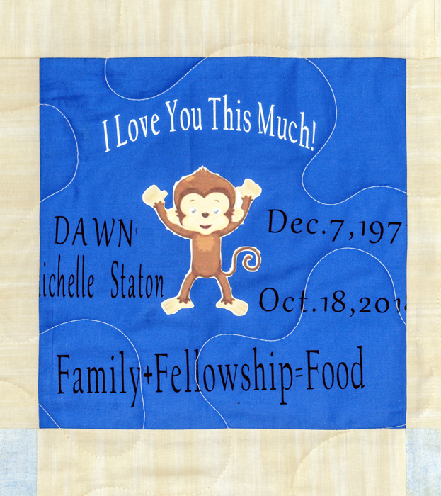 Quilt square for Dawn Staton with patch of a monkey and text reading: I love you this much! Family plus Fellowship equals Food