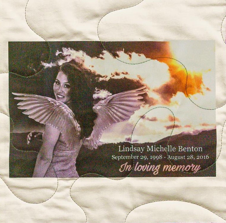 Quilt square for Lindsay Benton with a photo of Lindsay wearing angle wings