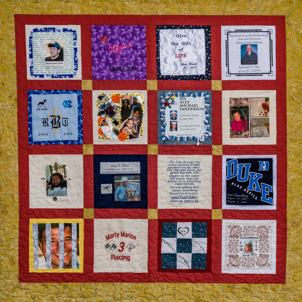 Colorful yellow and red quilt with 16 unique squares featuring donor names, photos, and memories