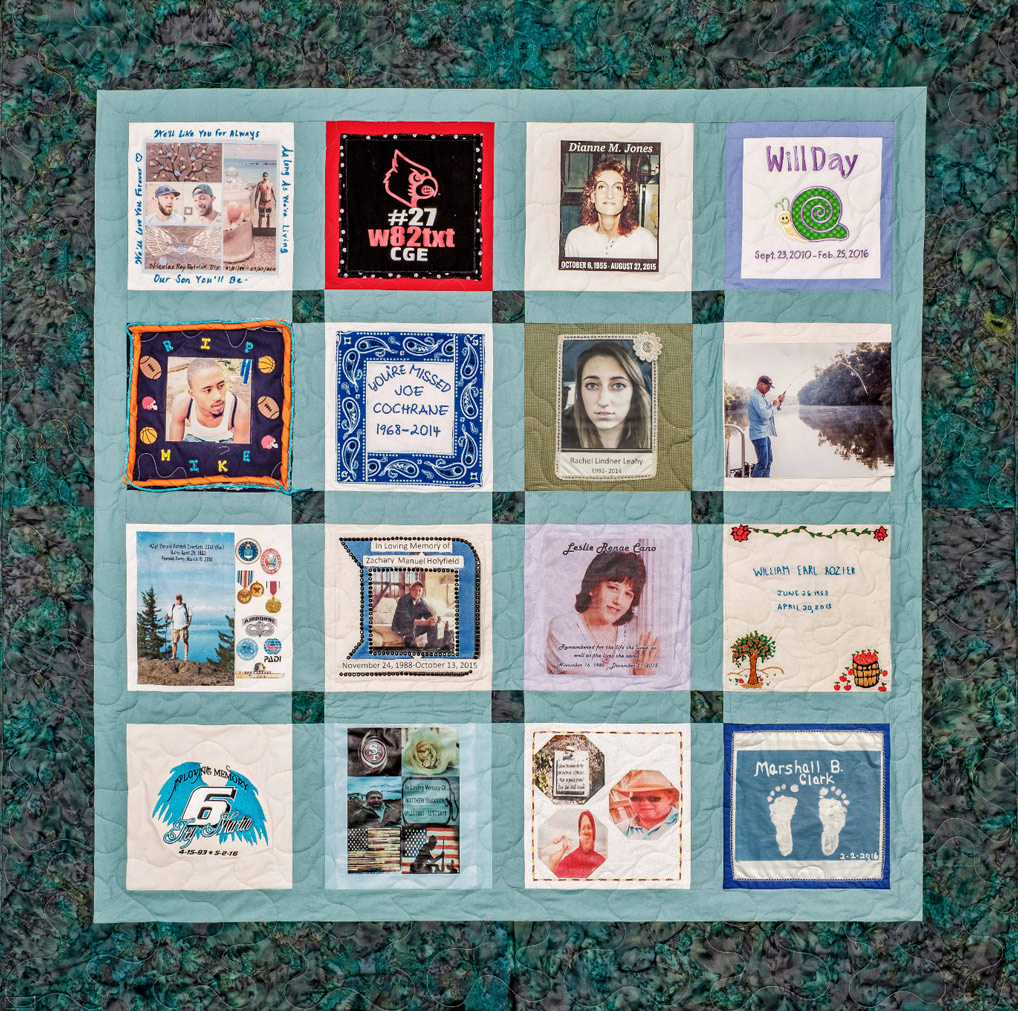 Colorful Green and teal quilt with 16 unique squares featuring donor names, photos, and memories
