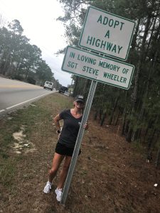 Kristen Holland next to Steve's highway