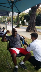 man getting blood pressure checked
