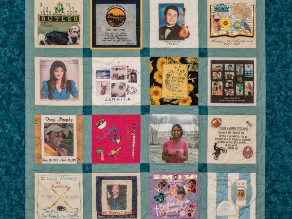 Colorful Blue and green quilt with 16 unique squares featuring donor names, photos, and memories