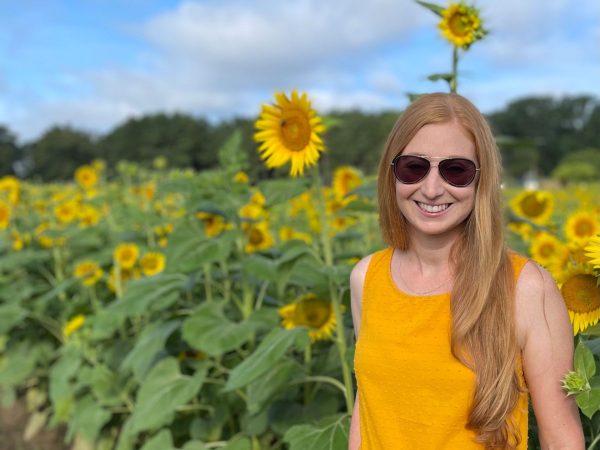 Lorelei Gregory in a sunflower field