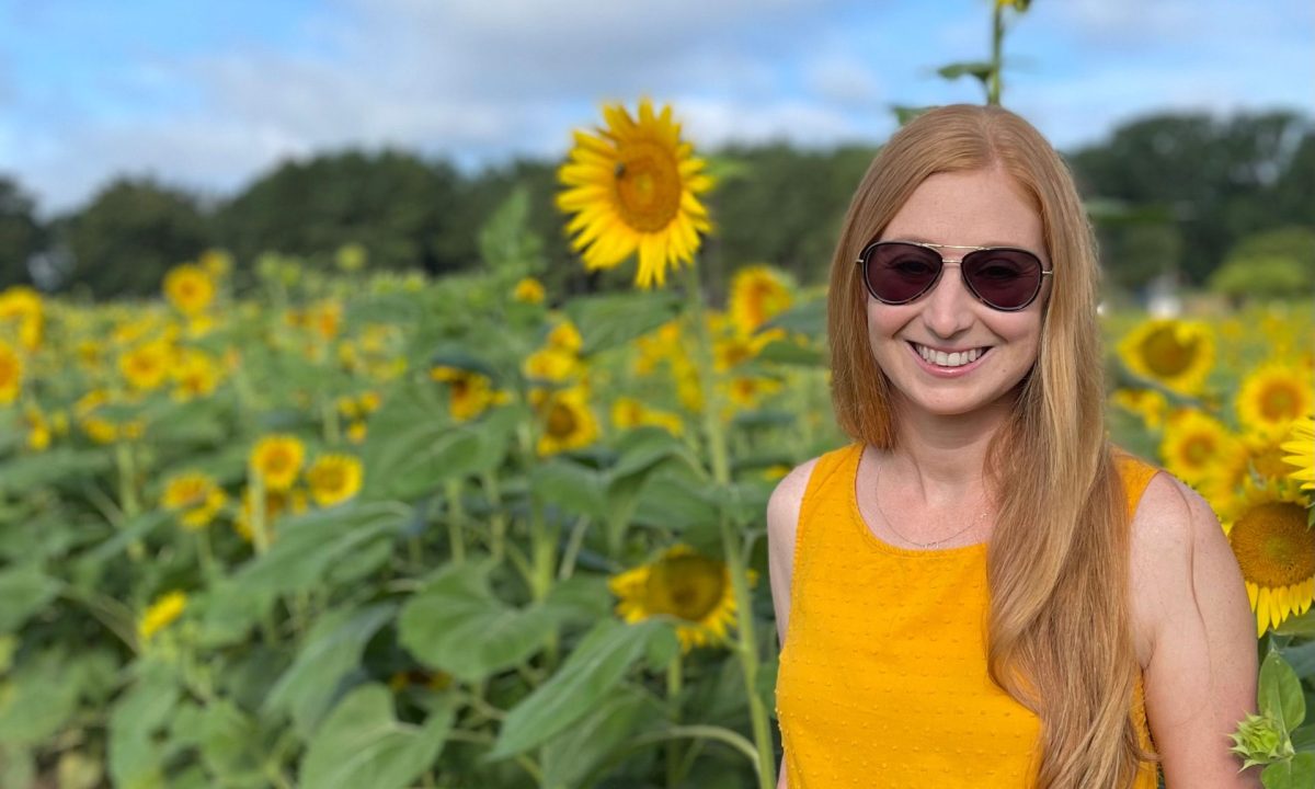 Lorelei Gregory in a sunflower field