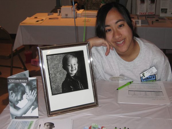 Kara with her donor Evan's picture