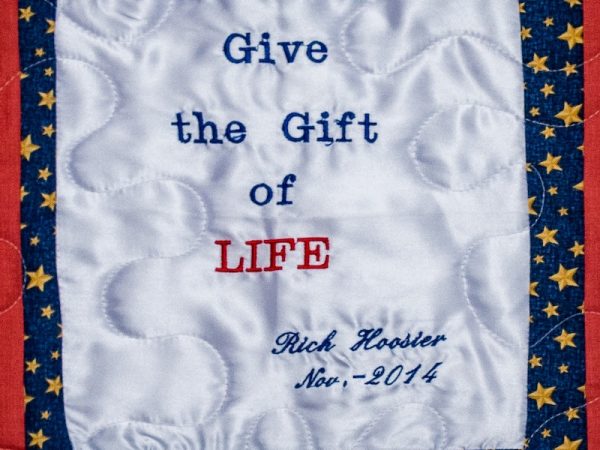 Quilt square for Rick Hoosier with text reading: Give the Gift of Life