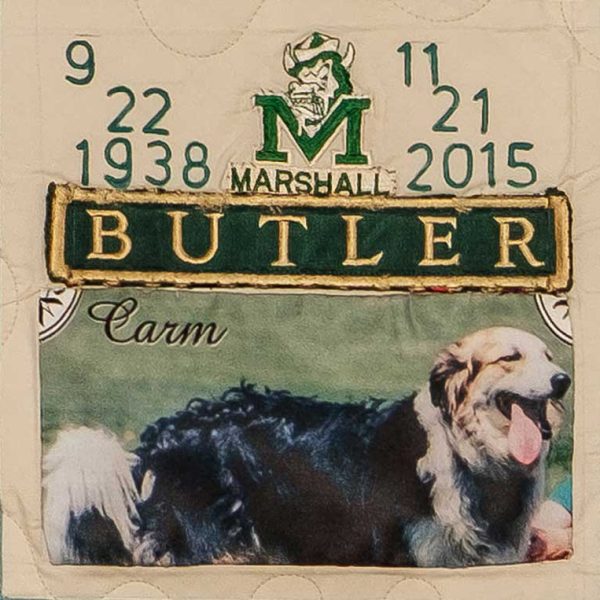 Quilt square for Shirrell Butler with a logo for M Marshall Butler and a photo of a dog.
