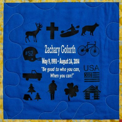 Quilt square for Zachary Goforth with patches for outdoor activities, camping, the military, the USA, and football #52. Text reading: Be good to who you can, when you can!
