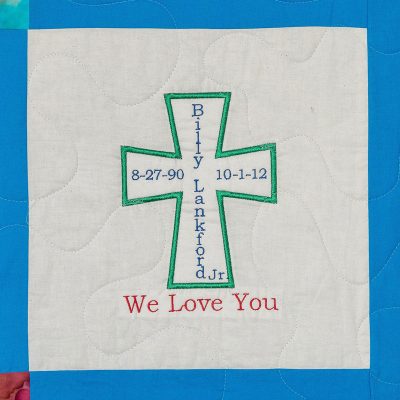 Quilt square for Billy Lankford, Jr. with a cross and text reading: We love you.