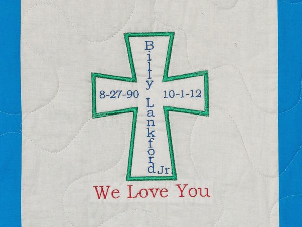 Quilt square for Billy Lankford, Jr. with a cross and text reading: We love you.