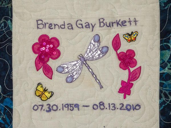 Quilt square for Brenda Gay Burkett with a dragon fly and butterflies.