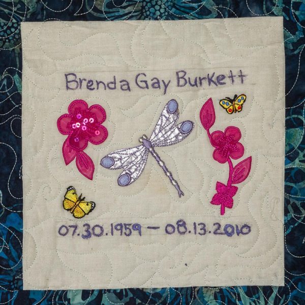 Quilt square for Brenda Gay Burkett with a dragon fly and butterflies.