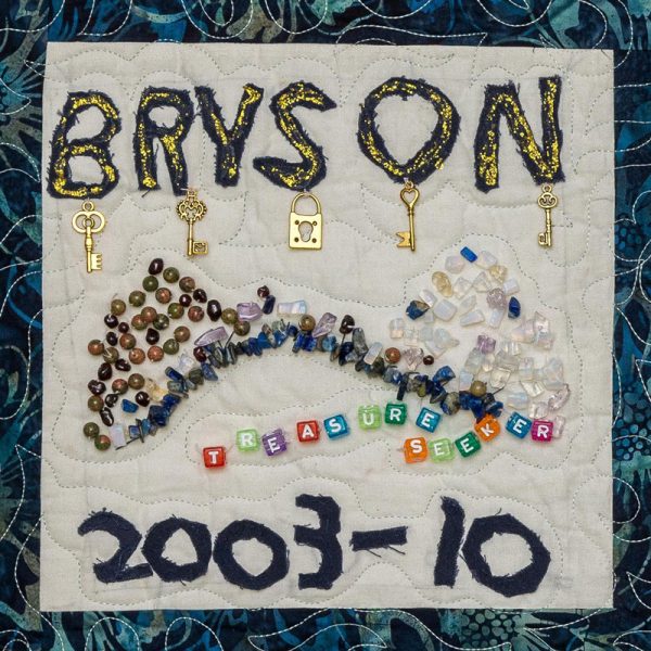 Quilt square for Bryson Cox with keys and locks and text reading treasure seeker.