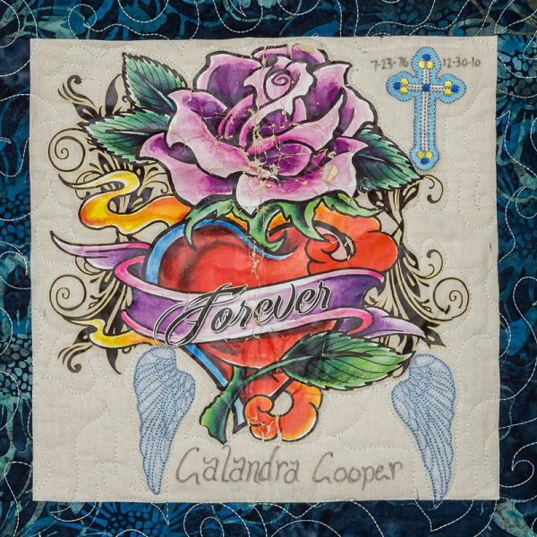 Quilt square for Calandra Cooper with flowers, roses, and angel wings.