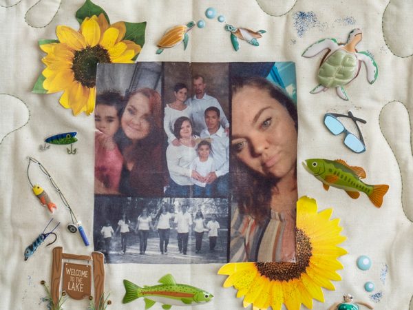 Quilt square for Chelsea Lewis with photos of family and pictures of fish and sea creatures