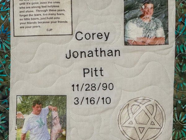 Quilt square for Corey Jonathan Pitt with photos of Corey holding a fish and a portrait.