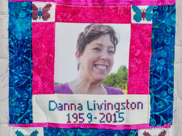 Quilt square for Danna Livingston with photo of Danna and patches of butterflies
