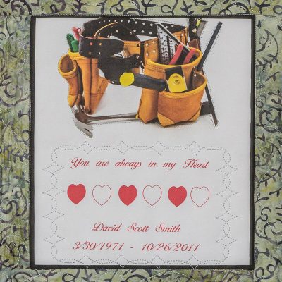 Quilt square for David Smith with a tool belt and text reading: you are always in my heart.