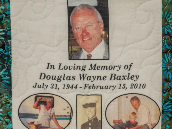 Quilt square for Douglas Baxley with photos of Douglass, a portrait, with family, and in his marine uniform.