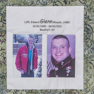 Quilt square for Edward Glenn Rhoads with photo of Glen in his marine uniform and in the snow.