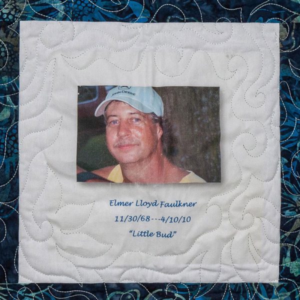 Quilt square for Elmer Lloyd Faulkner with a photo of Elmer and text reading: Little Bud