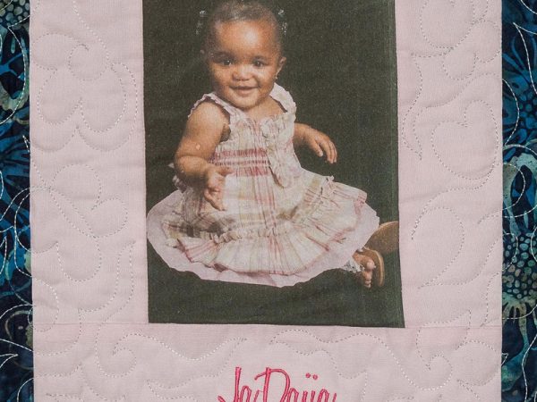 Quilt square for JaDajia Wright with a portrait of JaDajia