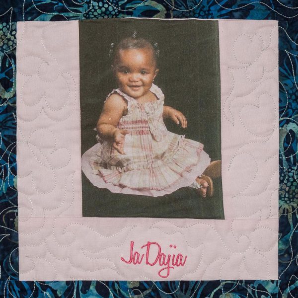 Quilt square for JaDajia Wright with a portrait of JaDajia