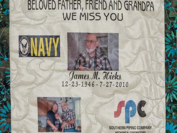 Quilt square for James M. Hicks with photos of James with family, and logos for the Navy and Southern Piping Company.