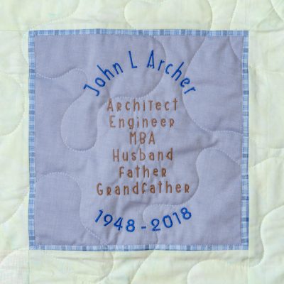 Quilt square for John Archer with text reading: Architect, Engineer, MBA, Husband, Father, Grandfather