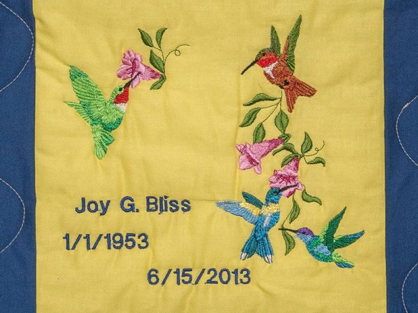 Quilt square for Joy Bliss with hummingbirds and flowers