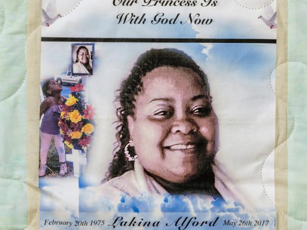 Quilt square for Lakina Alford with portrait of Lakina and text reading: Our princess is with God now