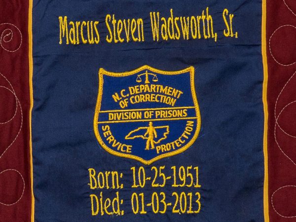 Quilt square for Marcus Wadsworth with patch of N.C. Department of Correction. Division of Prisons, Service, Protection.