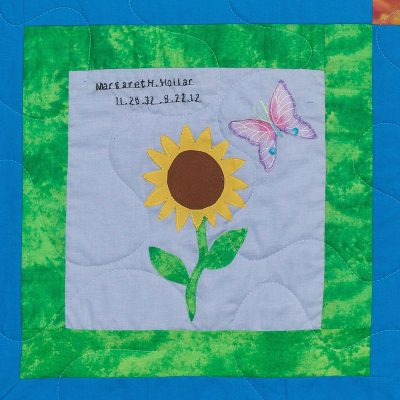 Quilt square for Margaret Hollar with a Sunflower and Butterfly
