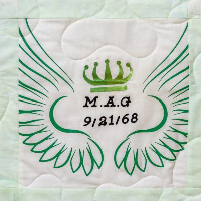 Quilt square for Mark Green with angel wings and crown