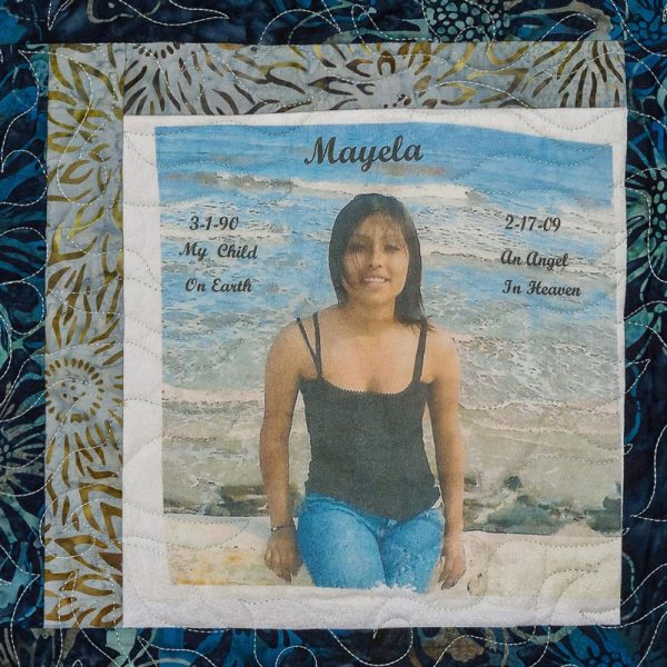 Quilt square for Mayela Orduna with photo of Mayela at the beach.