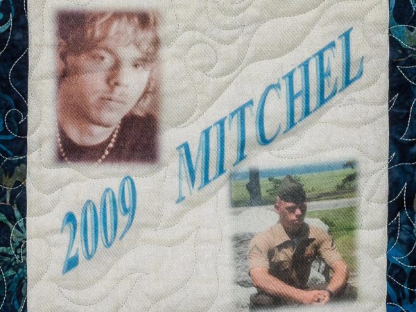 Quilt square for Mitchell Gibbs with a portrait of Mitchell and a photo of him in his marine uniform