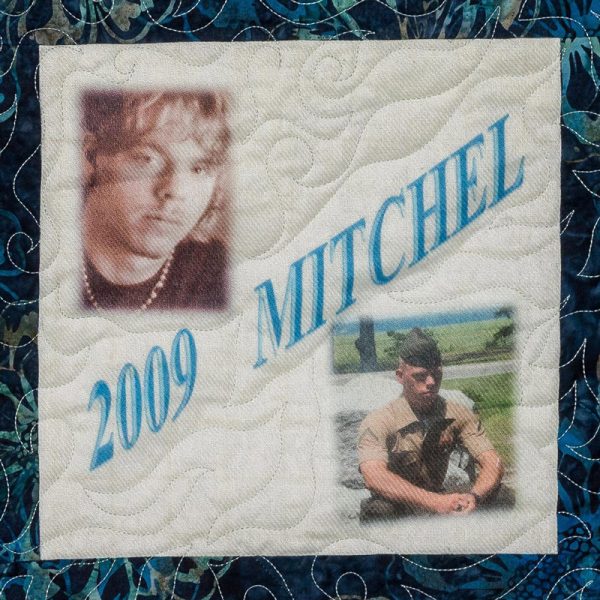 Quilt square for Mitchell Gibbs with a portrait of Mitchell and a photo of him in his marine uniform