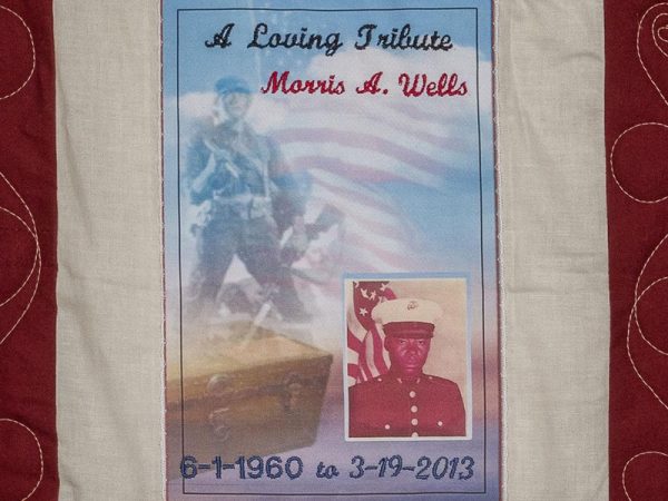 Quilt square for Morris Wells with a photo of Morris in his marine uniform.