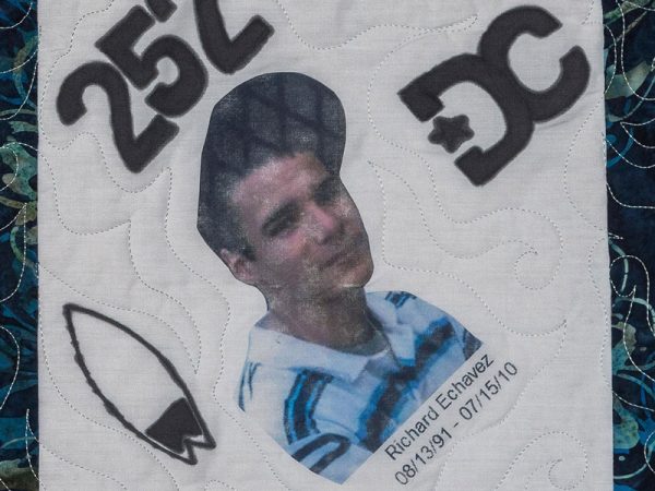 Quilt square for Richie Echavez with the number 252, DC, and a portrait of Richie