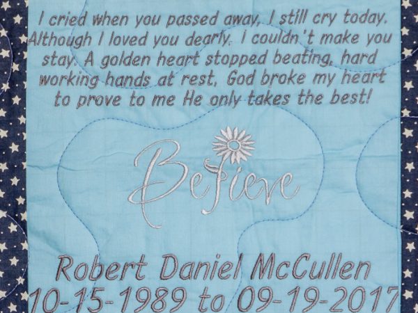 Quilt square for Robert McCullen with text reading: I cried when you passed away, I still cry today. Although I loved you dearly, I couldn’t make you stay. A golden heart stopped beating, hard working hands at rest, God broke my heart to prove to me, He only takes the best!