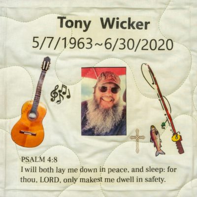 Quilt square for Tony Wicker with guitar, fishing rod, outdoor photo, and text reading: I will both lay down in peace, and sleep: for thou, Lord, only makest me dwell in safety. Psalm 4:8