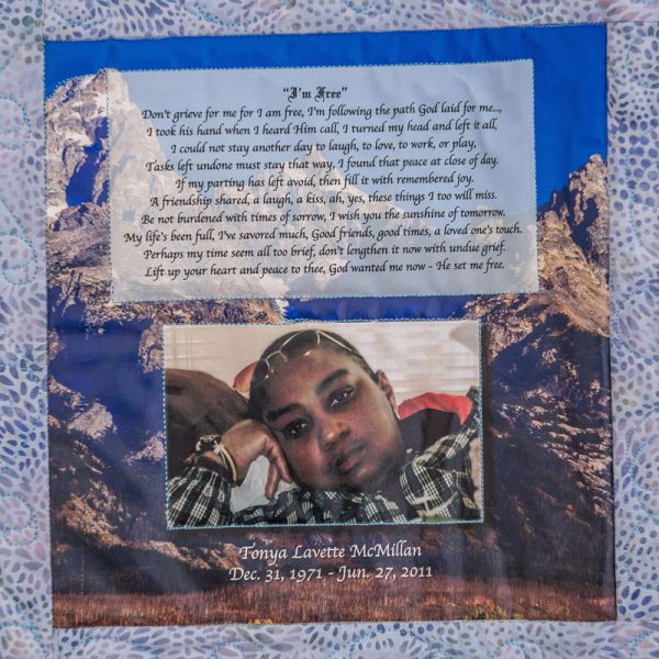 Quilt square for Tonya McMillan with a background of a mountain, the poem called I’m free, and a photo of Tonya.
