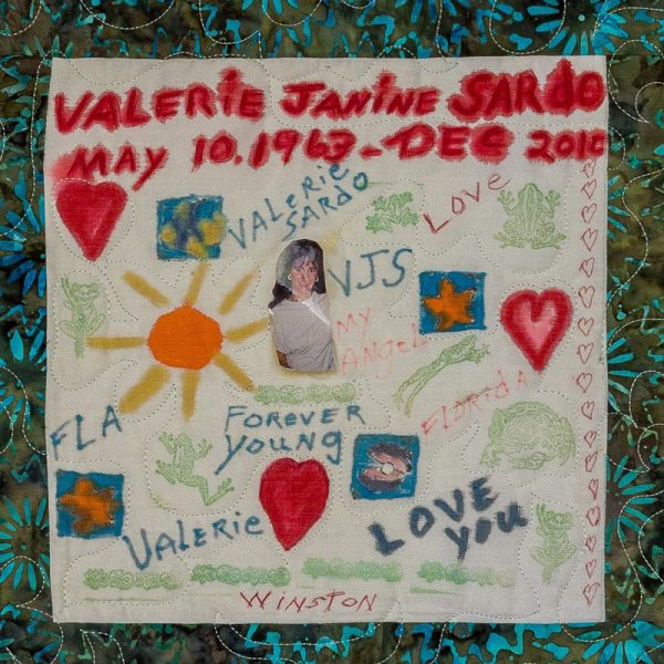 Quilt square for Valerie Sardo with a photo of Valerie, handwritten messages, and a background frog pattern.