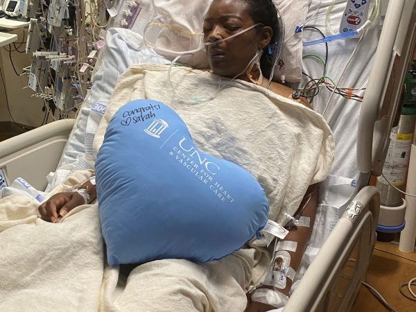 Sonya Marshmon, heart recipient, lies in hospital bed