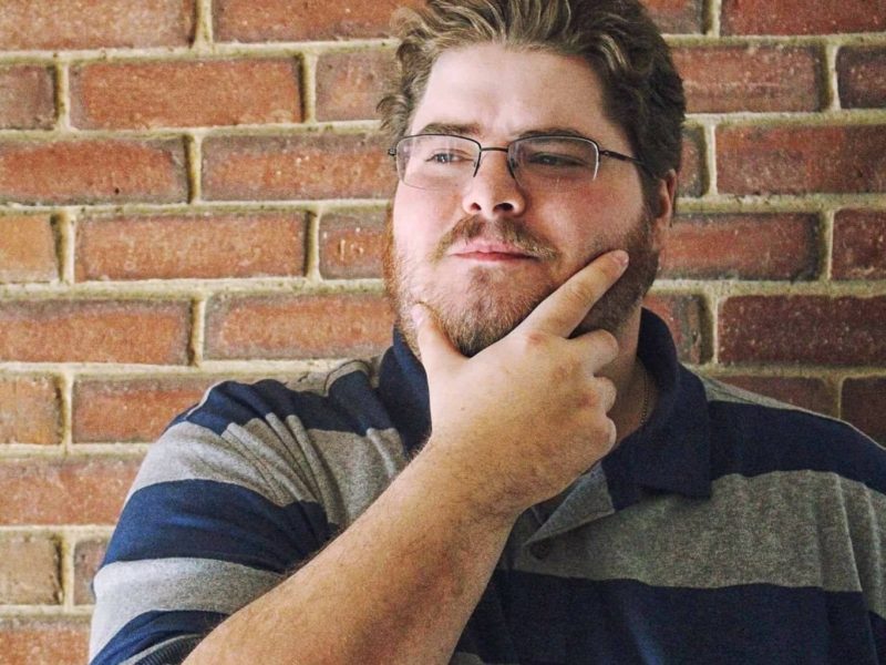Young man posing for camera