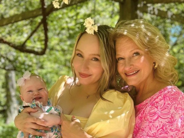 Kenan and her mother, Meredith, pose with Kenan's baby daughter