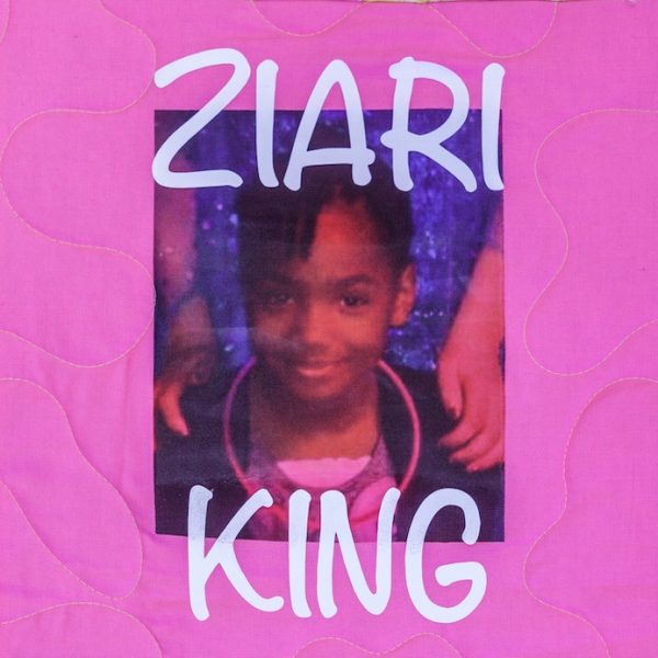 Quilt square for Ziari King with photo of Ziari on a pink background