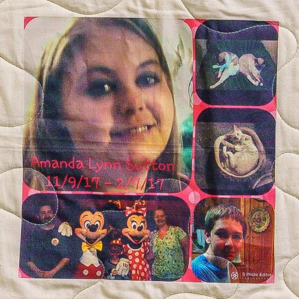 Quilt square for Amanda Sutton with photos of Amanda, family, and cats.