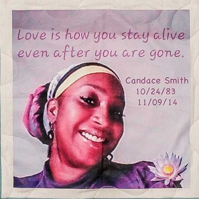 Quilt square for Candace Smith with portrait of Candace and text reading: Love is how you stay alive even after you are gone.